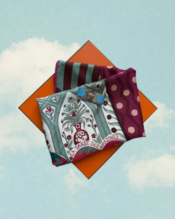 Three patterned cloths on an orange square with a blue sky background
