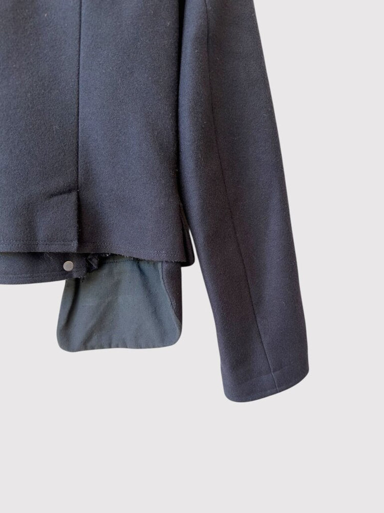 
                  
                    Right sleeve and inner lining of Maison Margiela Snaps Wool Grommet jacket, showcasing tailored fit and premium fall outerwear design.
                  
                