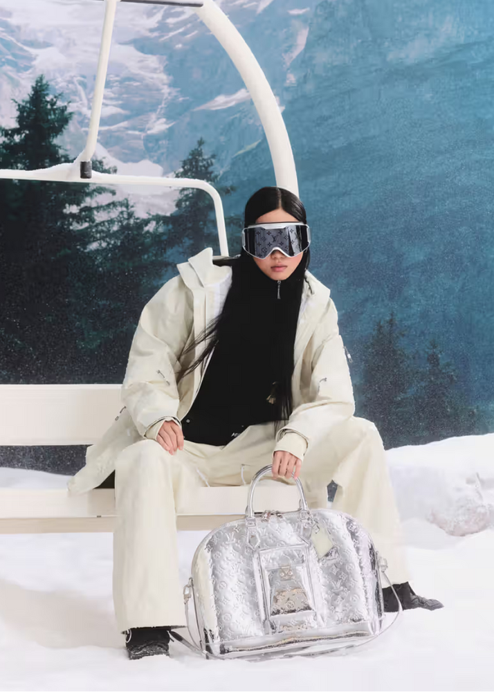 woman sitting on ski lift