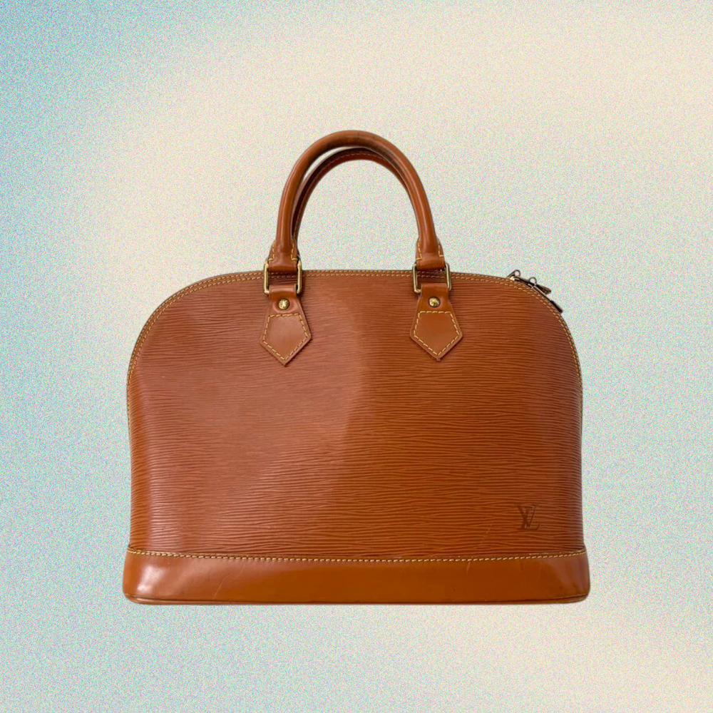 Brown handbag with gold accents on a gradient background